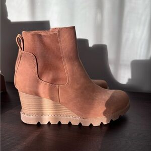 Brown wedge booties